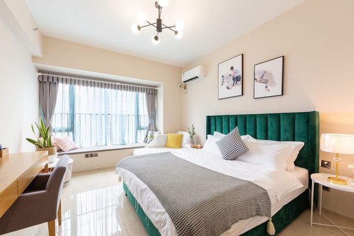 Imagen de la habitación del Hotel Sunnyrain Apartment. Foto 16