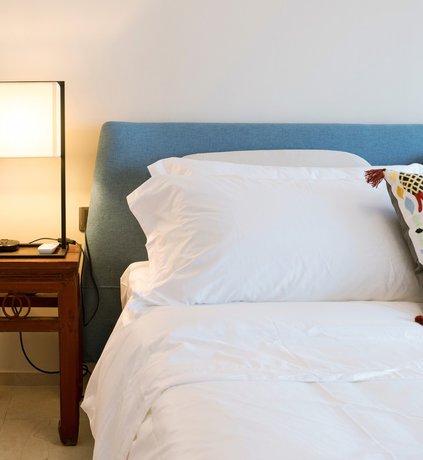 Imagen de la habitación del Hotel Sunnyrain Apartment. Foto 18