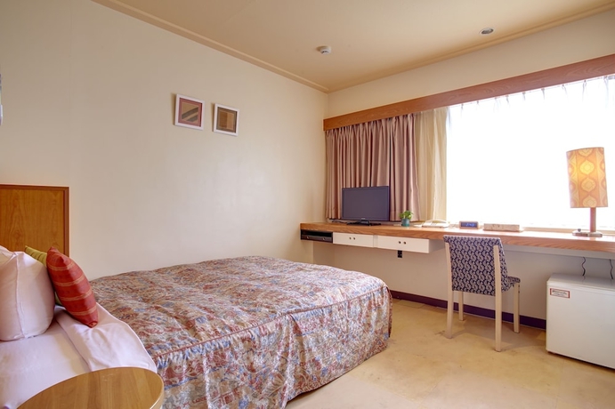 Imagen de la habitación del Hotel Sunpalace Kyuyoukan. Foto 11