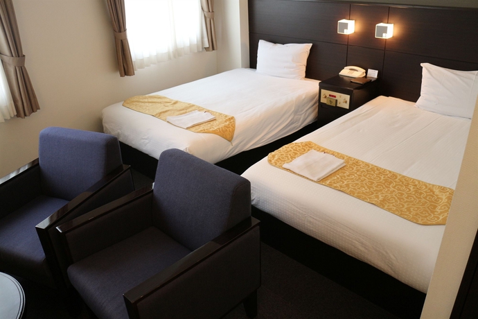 Imagen de la habitación del Hotel Sunplaza Annex. Foto 11