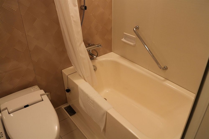 Imagen de la habitación del Hotel Sunplaza Annex. Foto 15
