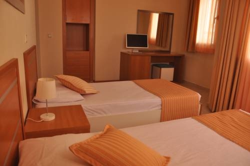 Imagen de la habitación del Hotel Sunpoint Family. Foto 4