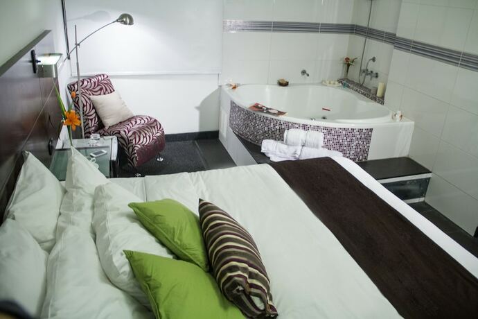 Imagen de la habitación del Hotel Sunqu. Foto 18
