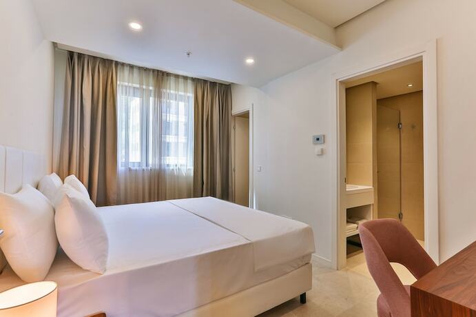 Imagen de la habitación del Hotel Sunraf Luxe Apartments. Foto 16