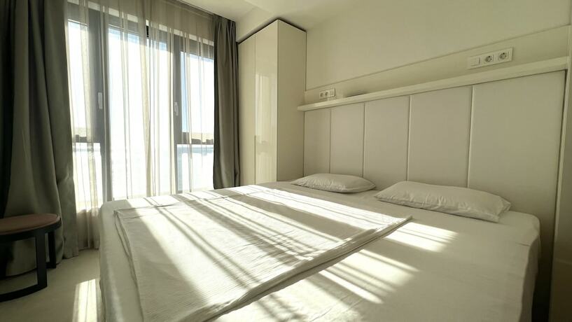 Imagen de la habitación del Hotel Sunraf Luxe Apartments. Foto 18