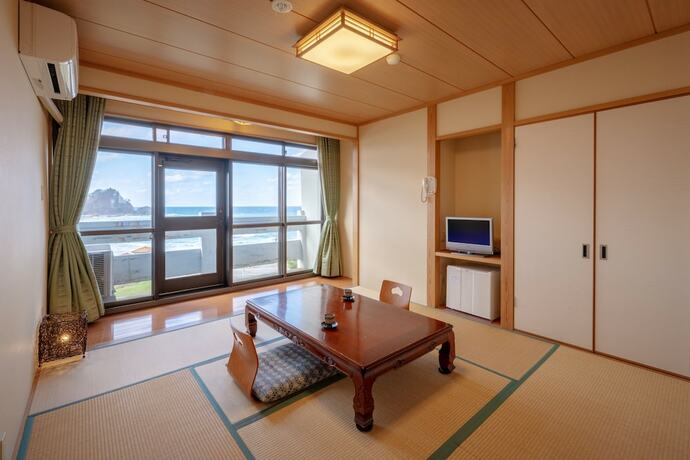 Imagen de la habitación del Hotel Sunresort Shonai. Foto 13