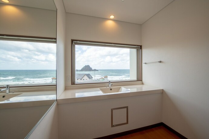 Imagen de la habitación del Hotel Sunresort Shonai. Foto 19