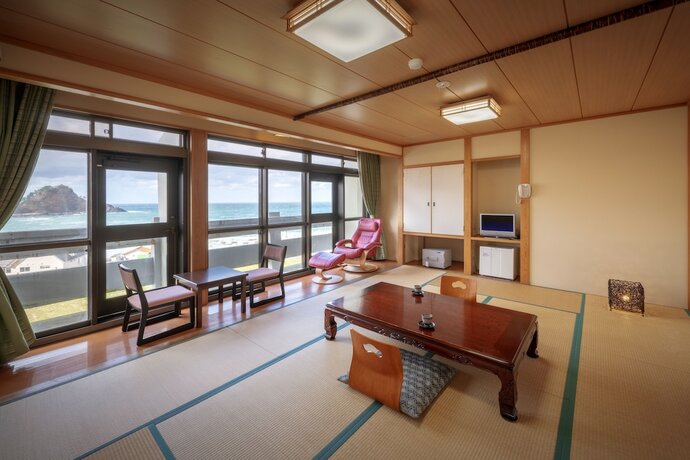 Imagen de la habitación del Hotel Sunresort Shonai. Foto 20