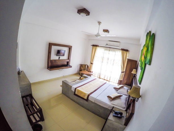 Imagen de la habitación del Hotel Sunrich Kandy. Foto 12