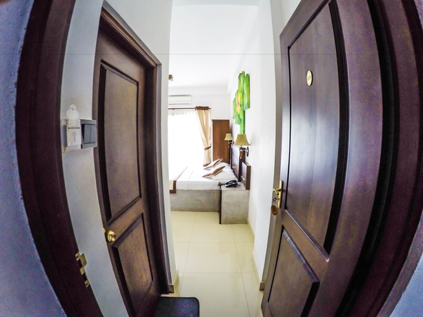 Imagen de la habitación del Hotel Sunrich Kandy. Foto 14