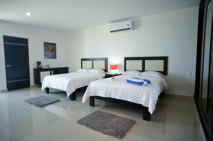 Imagen de la habitación del Hotel Sunrise 42 Suites Hotel. Foto 3