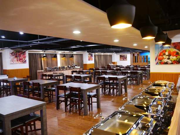 Imagen del bar/restaurante del Hotel Sunrise And Resort Taimali. Foto 4