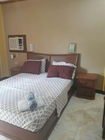 Imagen de la habitación del Hotel Sunrise Apartelle. Foto 5