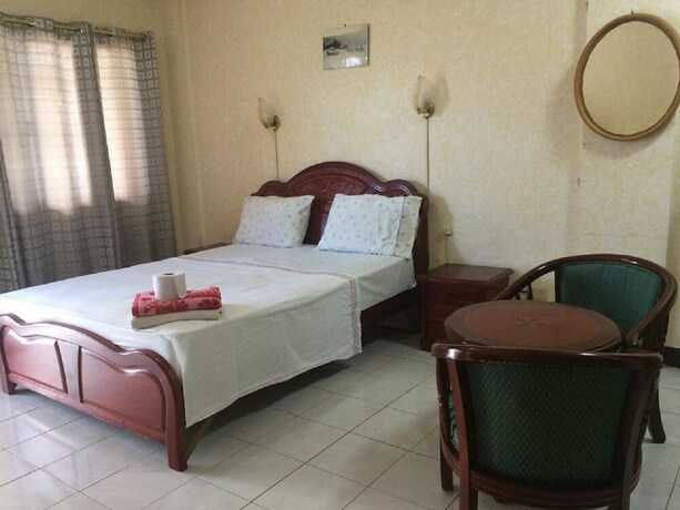 Imagen de la habitación del Hotel Sunrise Apartelle. Foto 6
