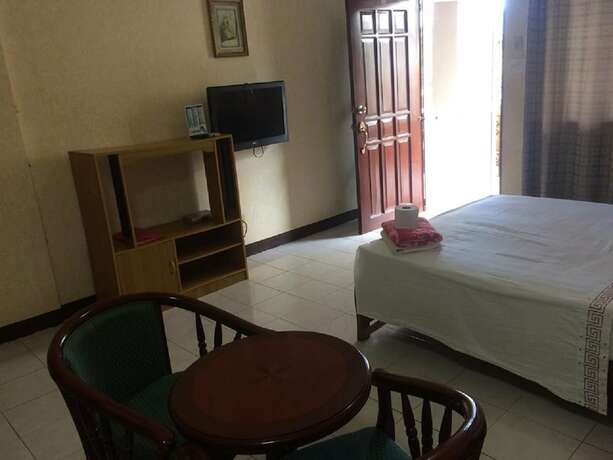 Imagen de la habitación del Hotel Sunrise Apartelle. Foto 9