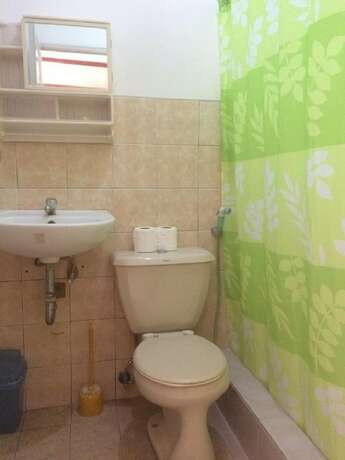Imagen de la habitación del Hotel Sunrise Apartelle. Foto 15