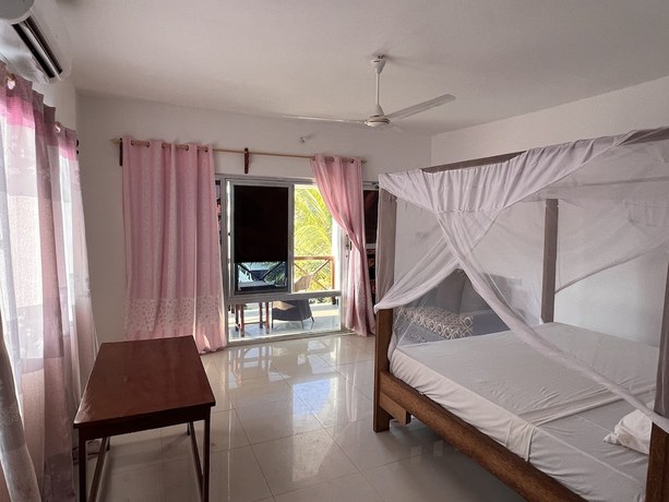 Imagen de la habitación del Hotel Sunrise Beach Nungwi. Foto 10