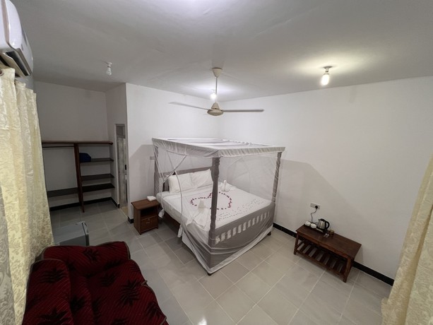 Imagen de la habitación del Hotel Sunrise Beach Nungwi. Foto 13