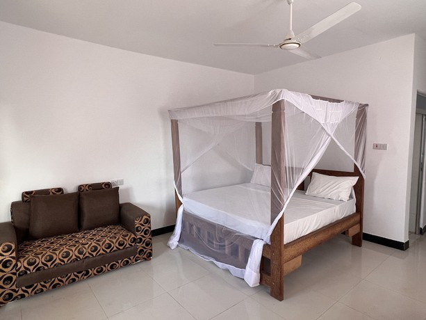 Imagen de la habitación del Hotel Sunrise Beach Nungwi. Foto 14