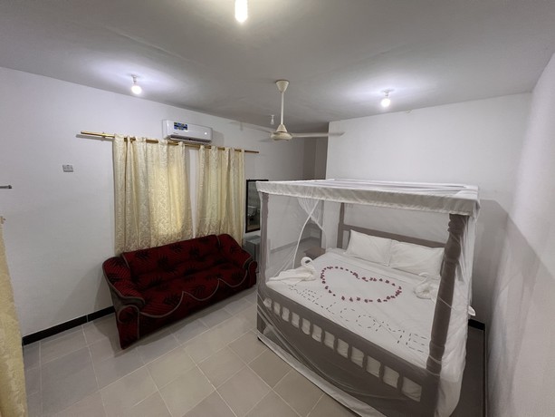 Imagen de la habitación del Hotel Sunrise Beach Nungwi. Foto 15