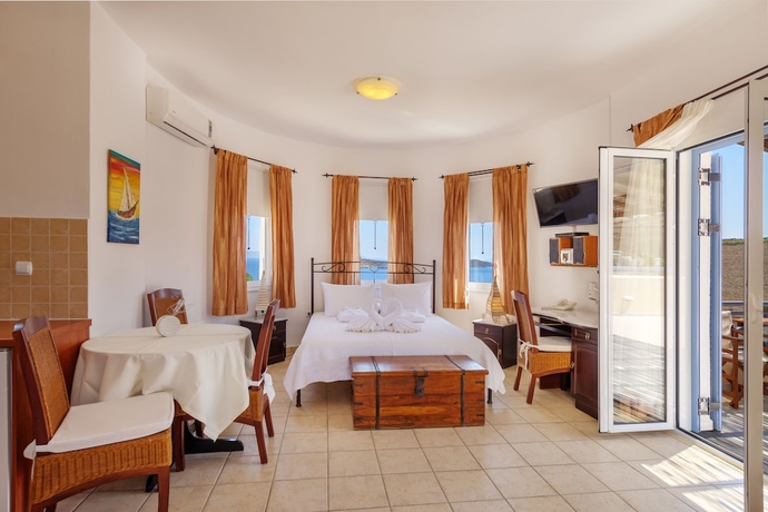 Imagen de la habitación del Hotel Sunrise Beach Suites. Foto 6