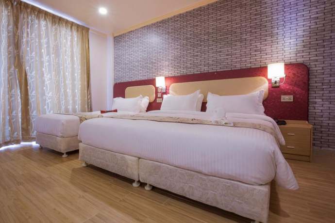 Imagen de la habitación del Hotel Sunrise Beach and Spa. Foto 6