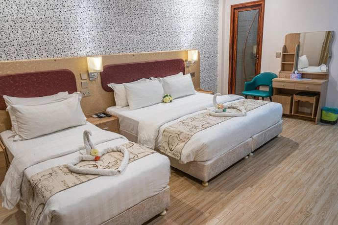 Imagen de la habitación del Hotel Sunrise Beach and Spa. Foto 10