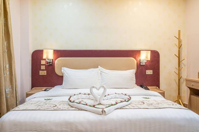 Imagen de la habitación del Hotel Sunrise Beach and Spa. Foto 18