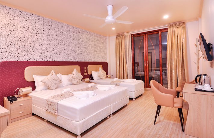 Imagen de la habitación del Hotel Sunrise Beach and Spa. Foto 19