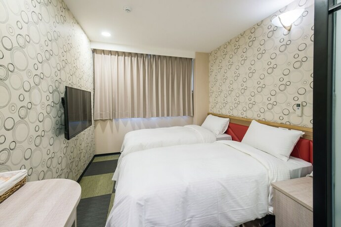 Imagen de la habitación del Hotel Sunrise Business Ximen. Foto 19