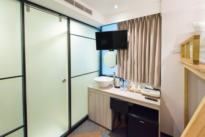 Imagen de la habitación del Hotel Sunrise Business Ximen. Foto 20