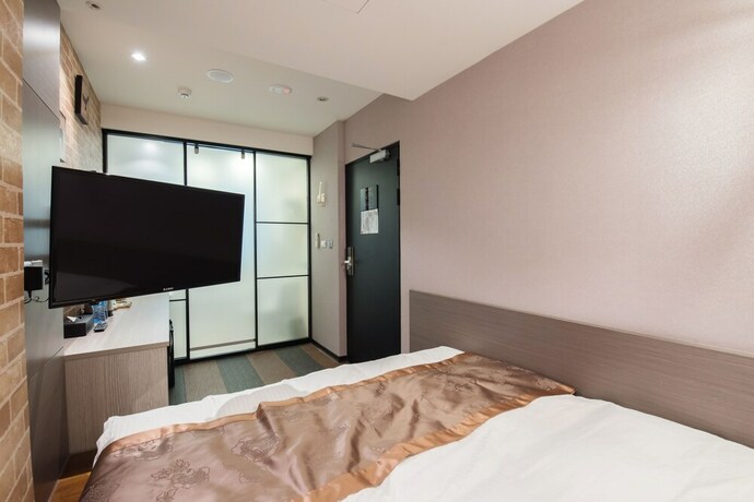 Imagen de la habitación del Hotel Sunrise Business Ximen. Foto 21