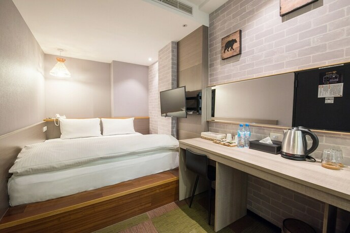 Imagen de la habitación del Hotel Sunrise Business Ximen. Foto 25
