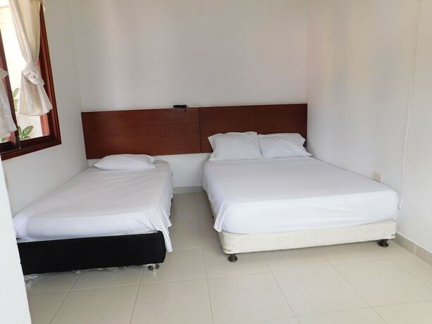 Imagen de la habitación del Hotel Sunrise Guamal. Foto 13