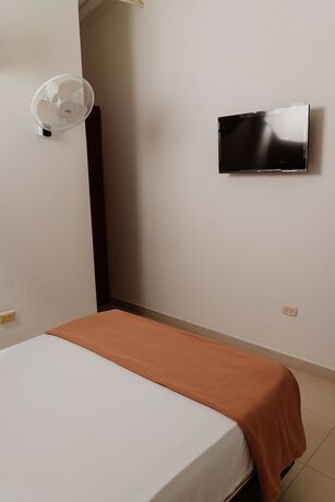 Imagen de la habitación del Hotel Sunrise Guamal. Foto 14