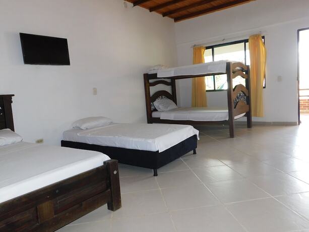 Imagen de la habitación del Hotel Sunrise Guamal. Foto 16