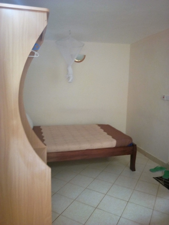 Imagen de la habitación del Hotel Sunrise Guest House, Ciudad de Meru. Foto 3