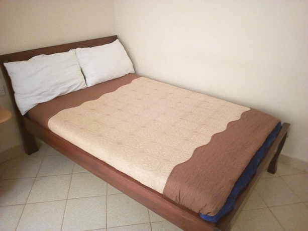 Imagen de la habitación del Hotel Sunrise Guest House, Ciudad de Meru. Foto 7