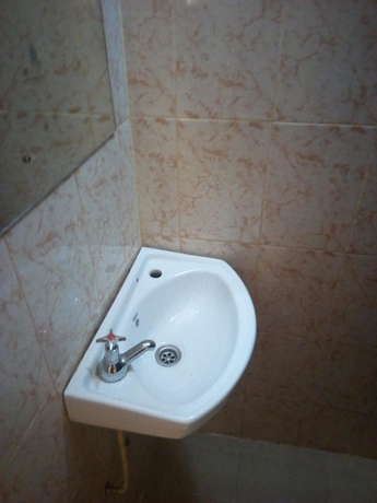 Imagen de la habitación del Hotel Sunrise Guest House, Ciudad de Meru. Foto 11