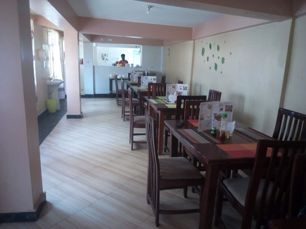 Imagen del bar/restaurante del Hotel Sunrise Guest House, Ciudad de Meru. Foto 2