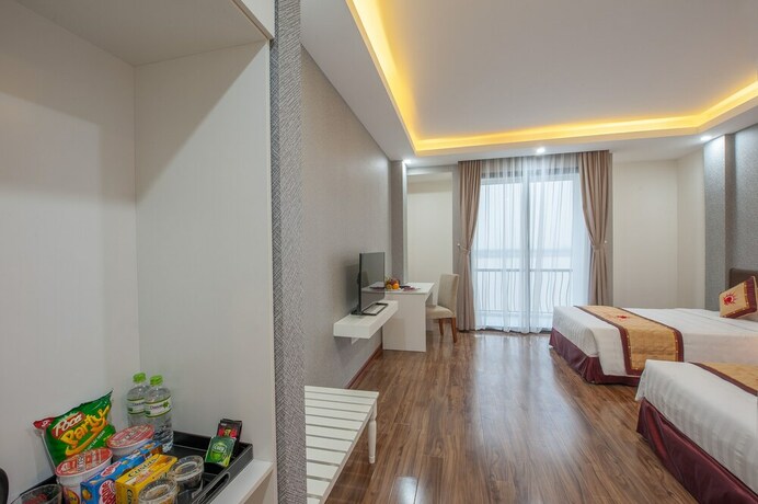 Imagen de la habitación del Hotel Sunrise Hanoi. Foto 29