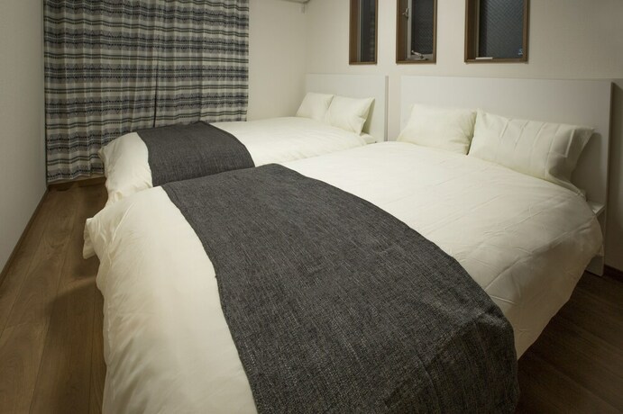 Imagen de la habitación del Hotel Sunrise Ikebukuro. Foto 22