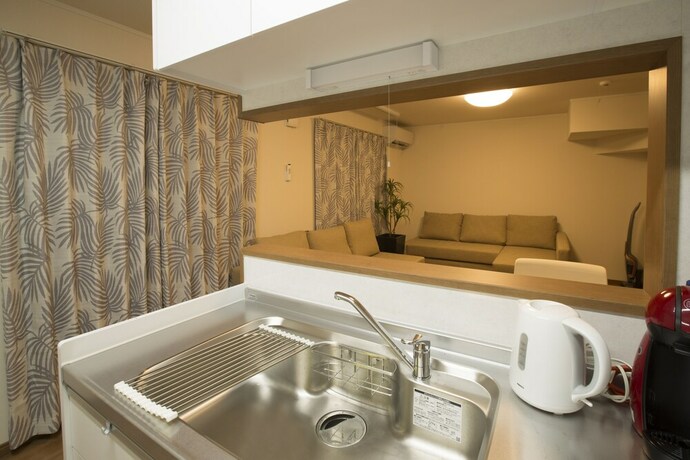 Imagen de la habitación del Hotel Sunrise Ikebukuro. Foto 25