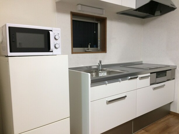 Imagen de la habitación del Hotel Sunrise Ikebukuro. Foto 29