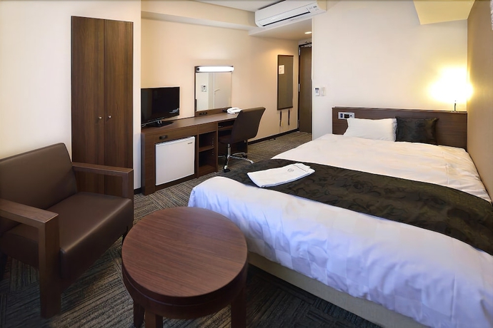 Imagen de la habitación del Hotel Sunrise Inn Iwaki. Foto 10