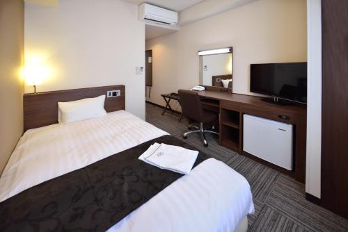 Imagen de la habitación del Hotel Sunrise Inn Iwaki. Foto 11