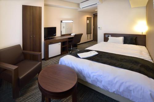 Imagen de la habitación del Hotel Sunrise Inn Iwaki. Foto 12