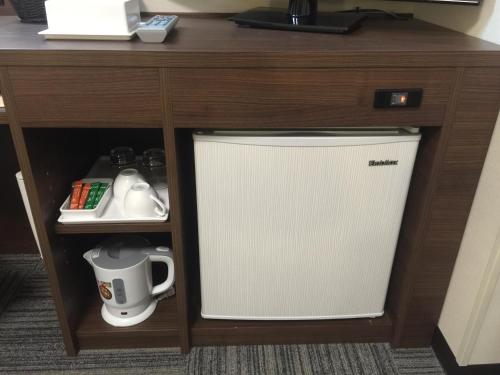 Imagen de la habitación del Hotel Sunrise Inn Iwaki. Foto 18