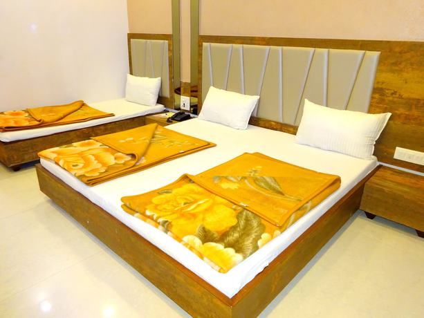 Imagen de la habitación del Hotel Sunrise Palace, Ambaji. Foto 4