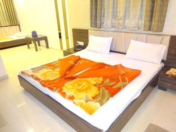 Imagen de la habitación del Hotel Sunrise Palace, Ambaji. Foto 10